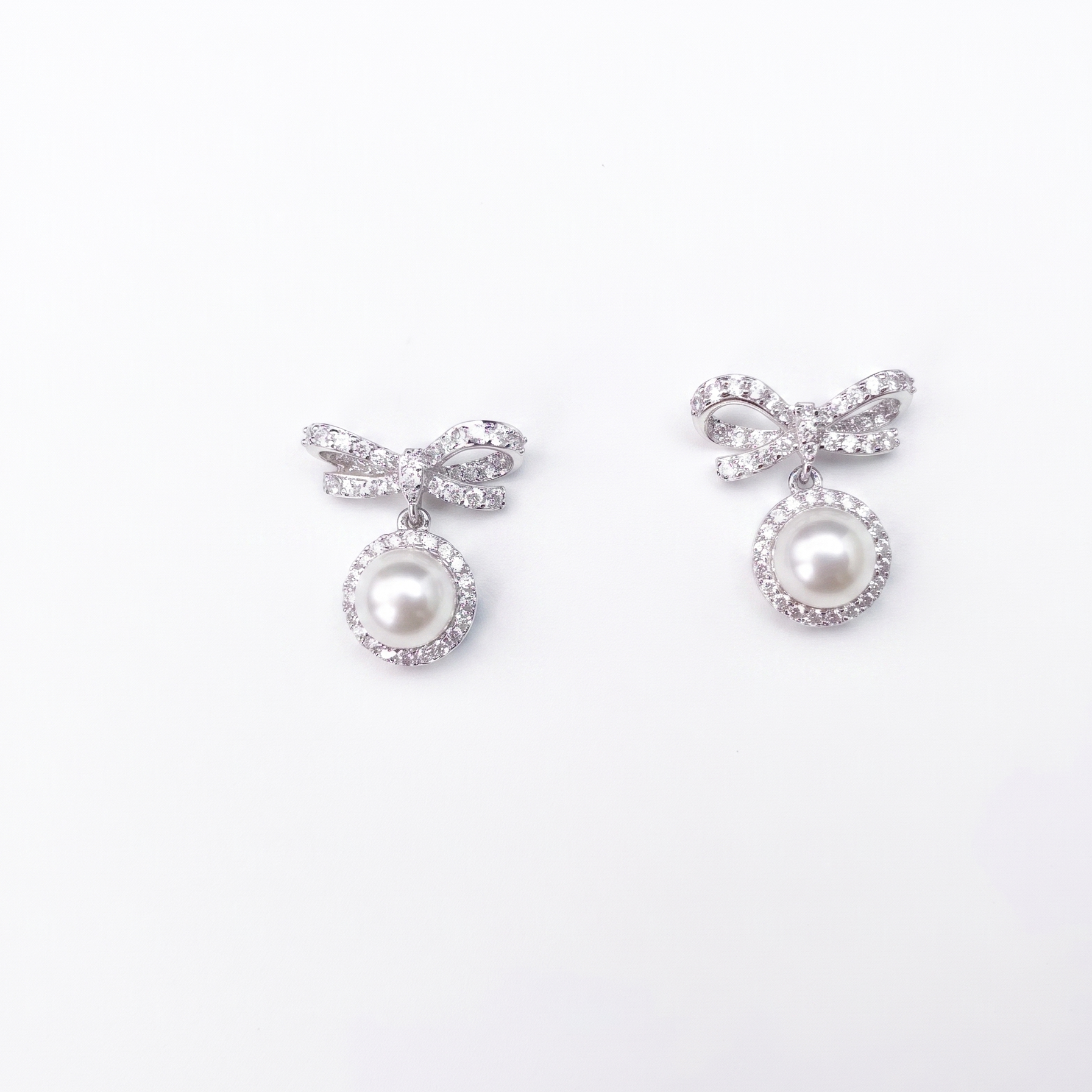 Elysian Pearl Bow Earrings